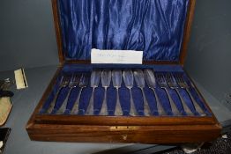 A cased set of fish knives and forks