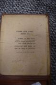 A vintage WW2 military cover or field book