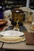 A selection of items including Staiger clock and sausage dog figure