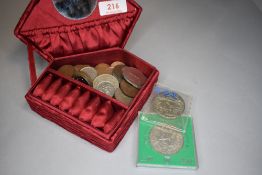 A selection of collectable coins and currency
