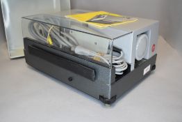 A Leica slide projector with a Colourplan 90mm lens