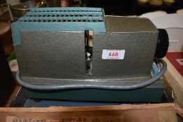 A Bell & Howell Hi-Lyte slide projector