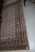 A traditional fireside rug, approx. 185 x 125cm