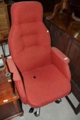 A vintage office chair on chrome base