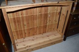 A modern pine bookshelf, w 122cm