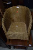 An early/mid C20th, child's Lloyd Loom armchair