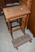 A traditional golden oak ecclesiastical prayer kneeler
