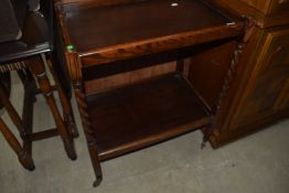 An early C20th, tea trolly, having twist supports