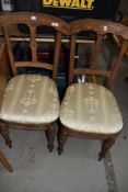 A pair of Victorian stripped salon chairs in the Aesthetic style