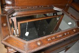 A 1920's oak canted frame mirror