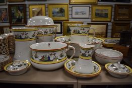 An extensive antique wash set including jug, basin,chamber pot and much more having cheerful