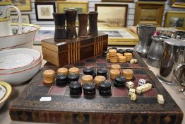 A selection of vintage board games including back gammon in box formed as a book.