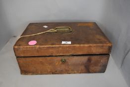 A vintage leather bound portable writing case having W.H.A Hornby castle engraved to brass plaque,