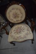 A reproduction armchair in the french style