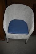 A vintage Lloyd Loom tub chair