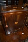 An Edwardian mahogany smokers cabinet