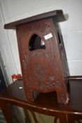 A poker work styled stool