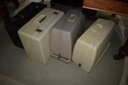 A selection of sewing machines and cases