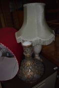 A selection of table lamps including including onyx and interesting converted Islamic style