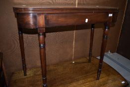 A 19th Century mahogany fold over tea table