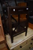 An early to mid 20th Century stained frame side table with drawer