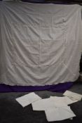 A mixed lot of vintage and antique bed linen and table linen, including damask.