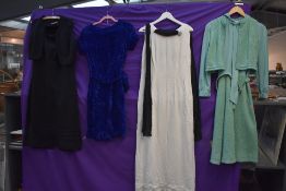 A mixed lot of ladies vintage clothing including 1960s white linen full length dress with black