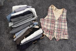 A box full of gents vintage and retro waistcoats, mixed sizes and styles.