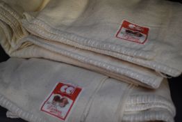 A pair of unused Dorma bed sheets having CC41 labels.