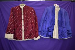 Two silk or silk blend Chinese jackets lined in wool, both having button fastening to front and