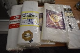 Five packets of vintage unopened bed sheets.