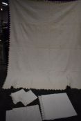 A Victorian white quilt and a collection of pillow cases and crotchet edged bolster cases.
