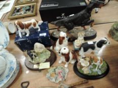 A selection of figures and figure studies including Borderfine arts Spaniel