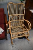 A vintage bamboo rocker
