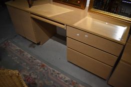 A light oak veneer laminate office desk