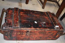 A vintage stained wood ammunition style box