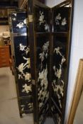 A traditional four panel shibyama style room divider/modesty screen