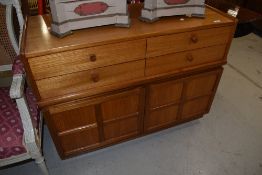 A vintage Nathan base unit, width approx 102cm
