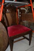 A 19th Century stained frame formal dining chair having red dralon drop in seat