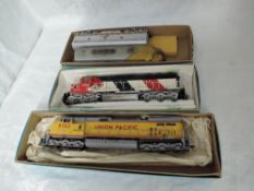Three Atlas and similar HO scale, Santa Fe Locomotives 5700 & 271C and Union Pacific 9703, all in