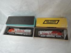 A Ajin Overland Models Inc HO scale American Brass Santa Fe Locomotive 834 and a Rail Power Product