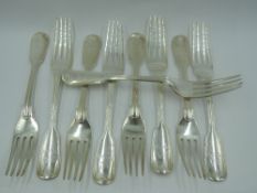 Nine Victorian silver dinner forks in the fiddle and thread pattern, bearing Boar's head crest to