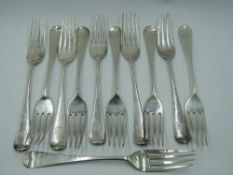 Eleven Victorian silver dessert forks of plain form bearing monogram to terminals, Exeter 1873,