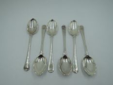 Six Victorian silver coffee spoons having monogrammed terminals and frilled and scalloped bowls,