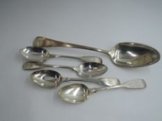 A Georgian silver table spoon of Old English form bearing monogram to terminal, London 1792,