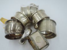 Nine HM silver napkin rings of various forms, approx 131.9g