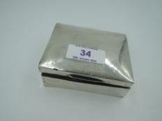 A small silver cigarette box of plain rectangular form, Birmingham 1925, makers mark worn, (AF),