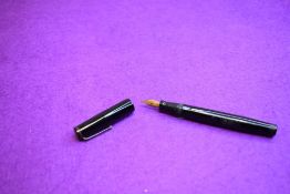 A Mabie Todd & Co Swan Leverless twist filler, in black and a Phillips, Oxford nib. Approx 12.7cm