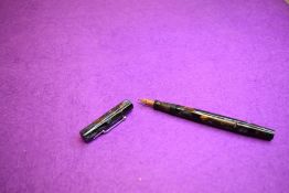 A Mabie Todd & co Swan Minor M1 leverfill fountain pen in marble , screw cap, with Swan No1 nib.
