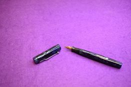 A Mabie Todd & Co Blackbird Self filler Leverfill fountain pen, in blue marble, with two narrow